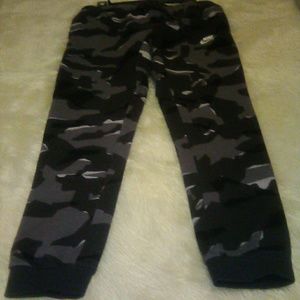 Man's Nike sweat suit.